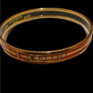 Hermès Black and Gold Bangle